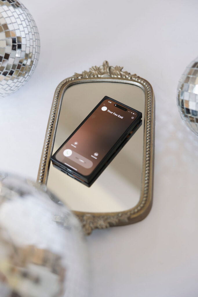 Louisville branding photographer | a cell phone with a phone call coming in from 'Your fav esti".