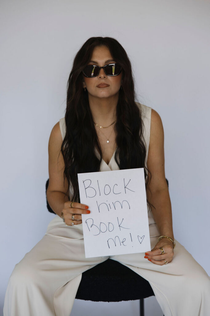 Louisville branding photographer | an esthetician holding a piece of paper that says 'block him book me!'