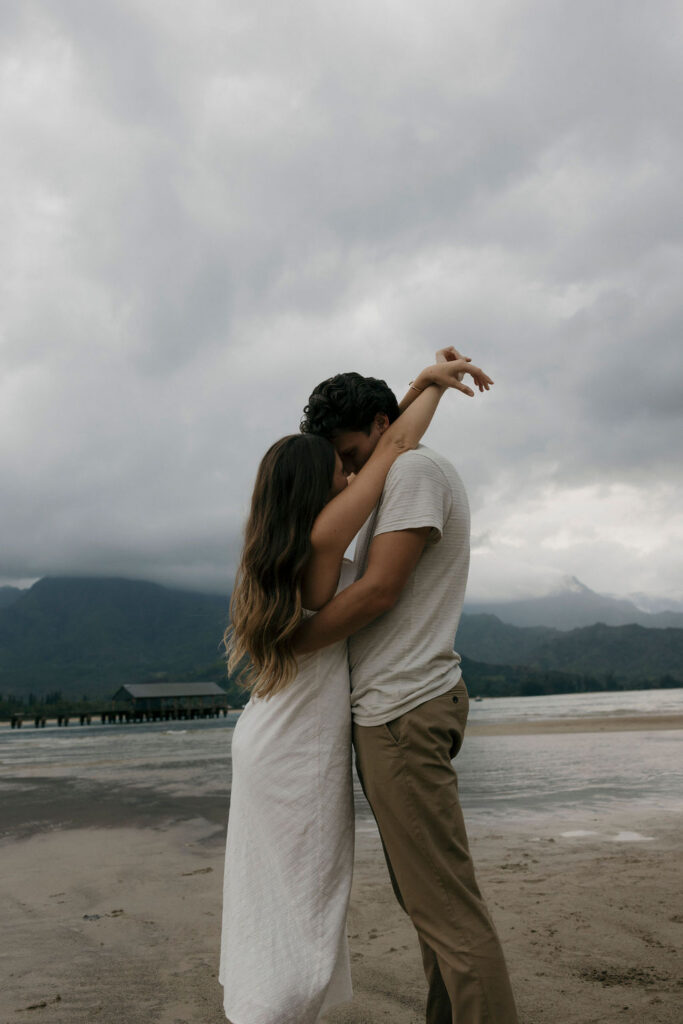 Moody engagement photos at Hanalei Bay in Kauai, Hawaii