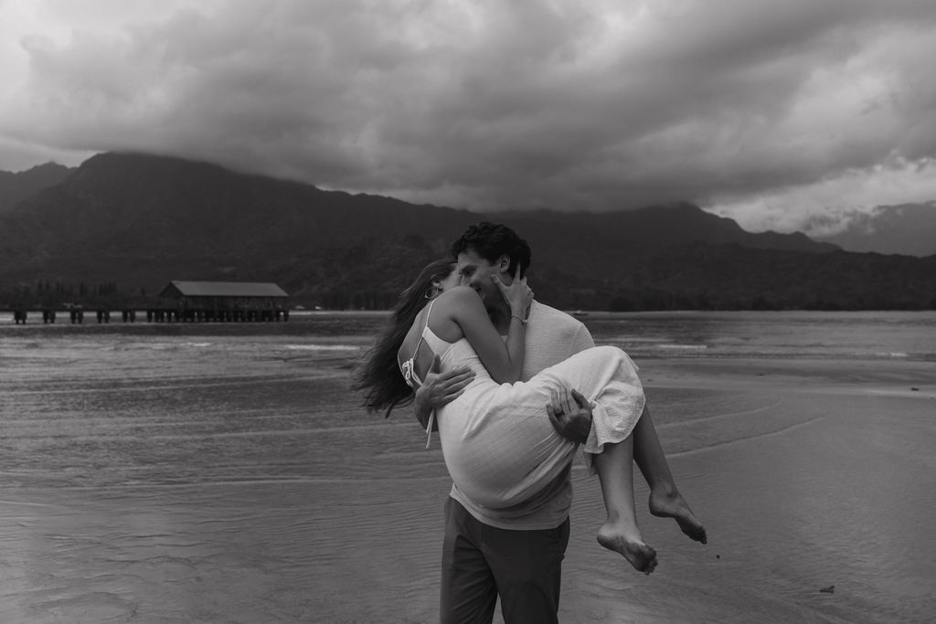 Romantic destination engagement photos at Hanalei Bay in Hawaii