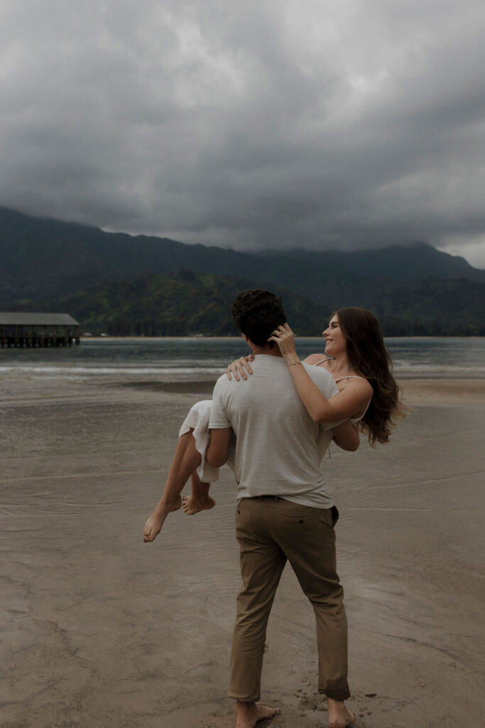 Natural and playful Kauai engagement photographs on the beach