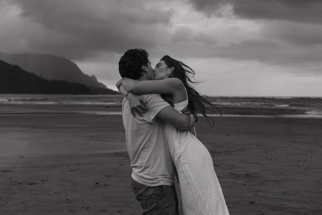 Moody and intimate engagement portrait photographed in Kauai, Hawaii