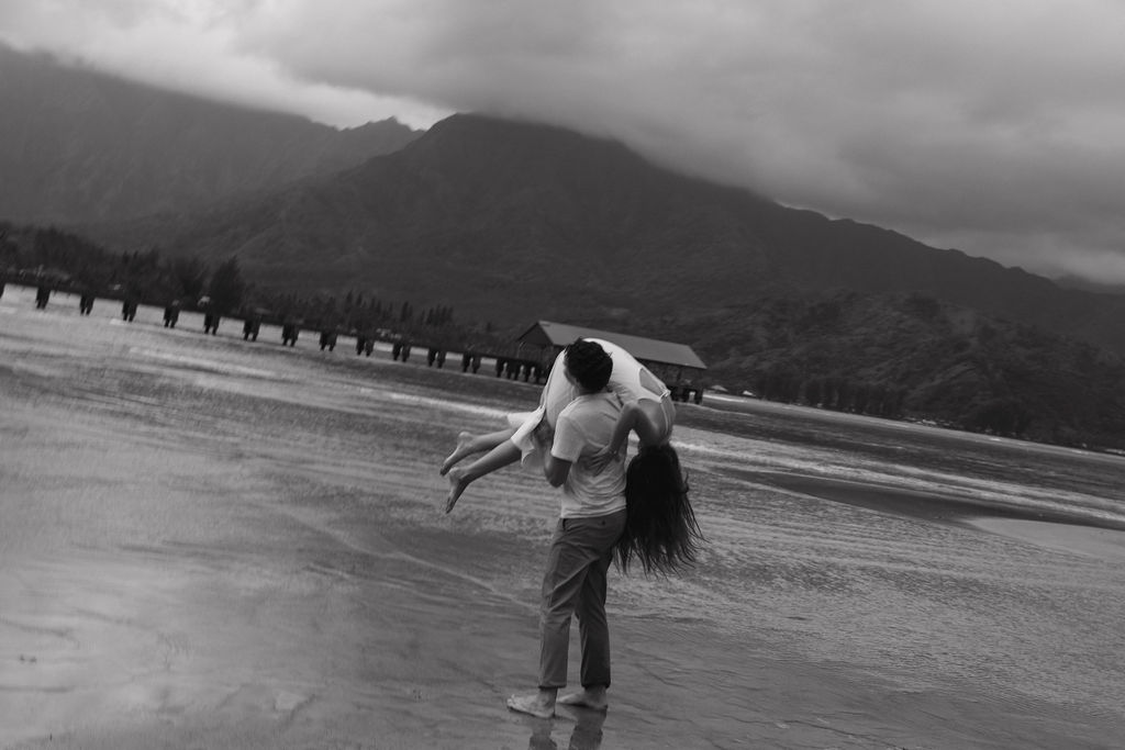 Couple enjoying a playful moment during their Hawaii engagement session