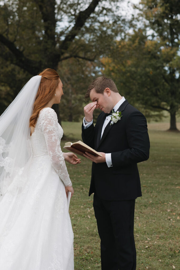 The groom getting emotional as he reads his vows to his future bride before the ceremony.