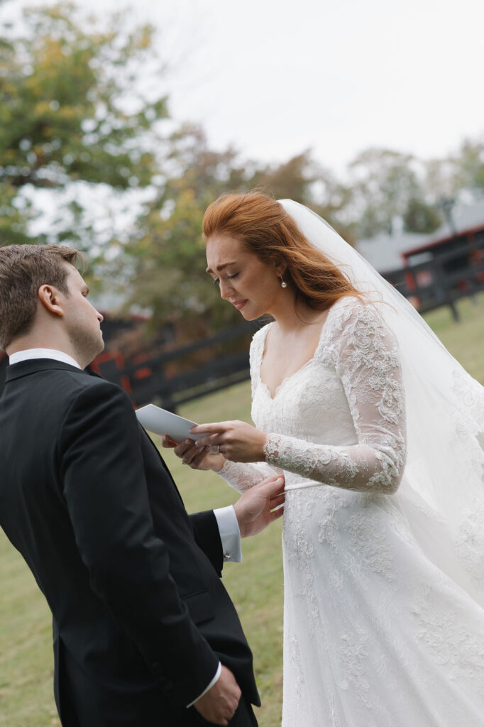 The bride getting emotional as she reads her vows to her future husband before the ceremony.